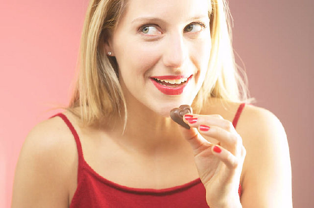 Bible foods- woman eating candy